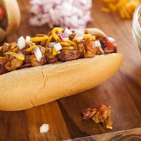 Homemade Hot Chili Dog with Cheddar Cheese and Onions