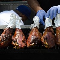 Large turkey legs on outdoor grill at Old Colorado City Territory Days, near Colorado Springs, Colorado.