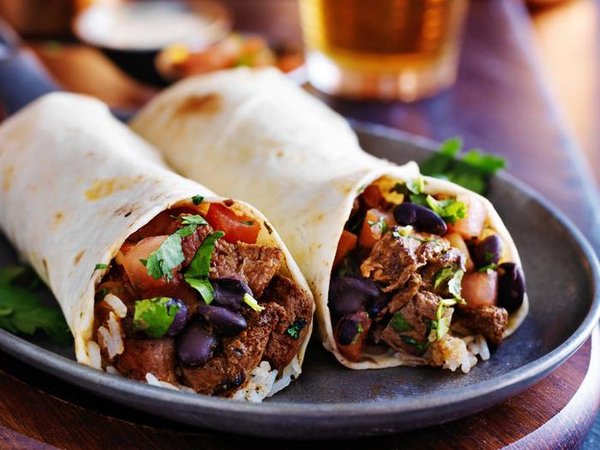 two beef burritos with rice, black beans and salsa