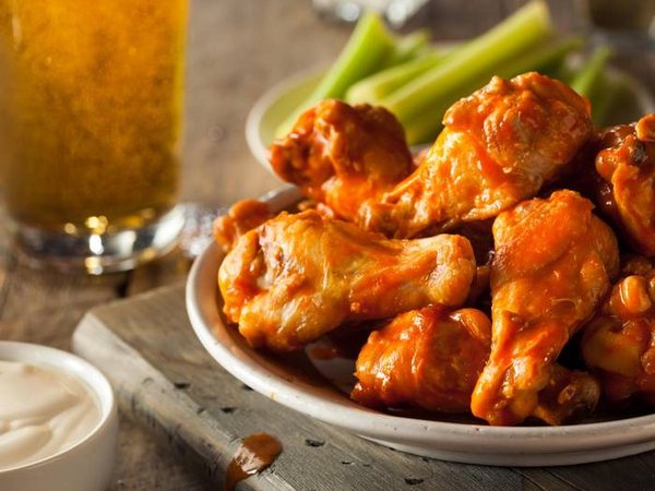 Spicy Homemade Buffalo Wings with Dip and Beer