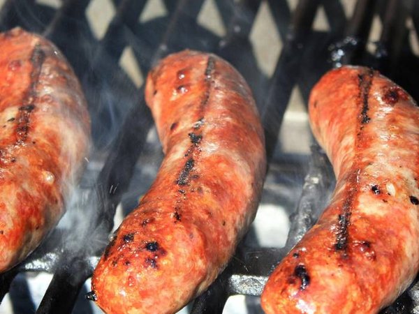 Brats Cooking on the Grill