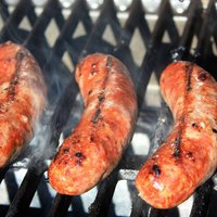 Brats Cooking on the Grill
