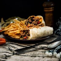 beef tacos served with golden French fries