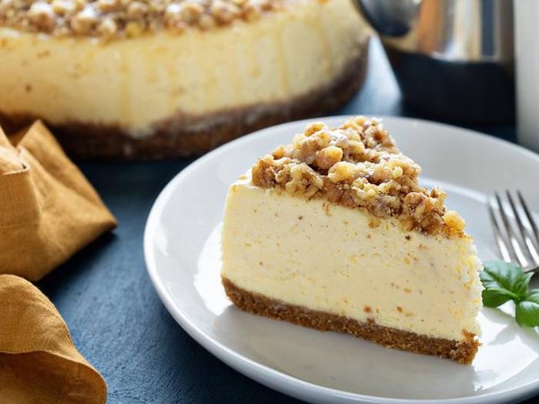 Pecan caramel cheesecake on the table.