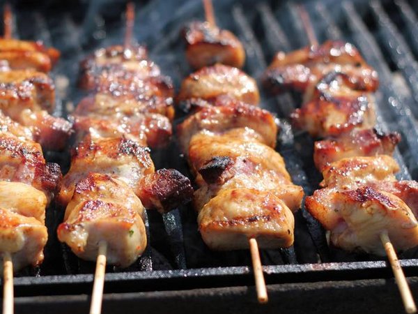 Chicken meat pieces being fried Shallow DOF