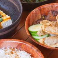 Peranakan food prepared and served on a boat