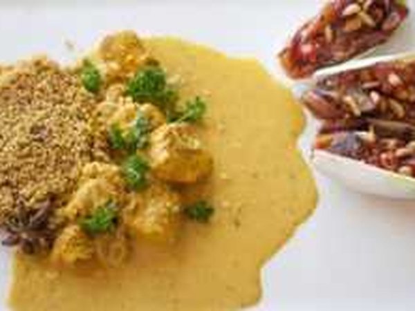 Coconut chicken with pine couscous