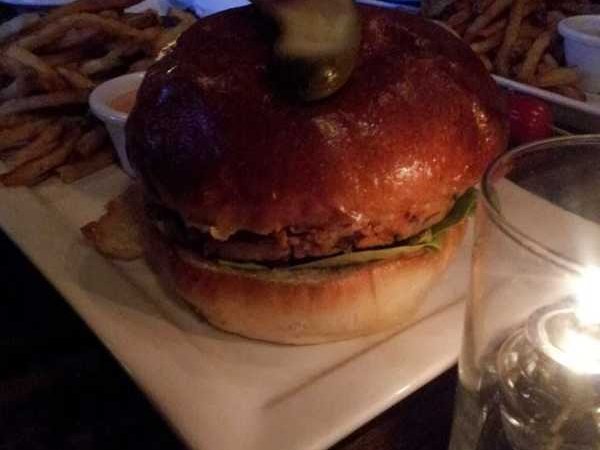 Veggie burger and yukon gold fries just before being attacked by hungry diners.
