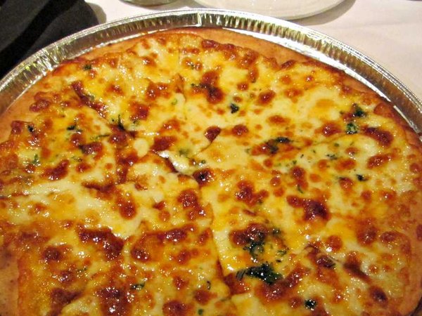 Spagio Four Cheese Pizza with mozzarella, cheddar, gruyère and gouda cheeses!