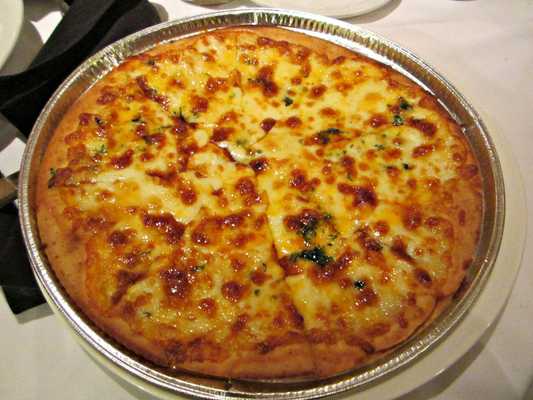 Spagio Four Cheese Pizza with mozzarella, cheddar, gruyère and gouda cheeses!