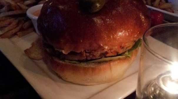 Veggie burger and yukon gold fries just before being attacked by hungry diners.