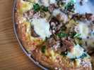Harvest Pizza with ramps! Delicious! The special featured wild ramps from Ohio and West Virginia, truffled mushrooms from Athens County, fennel sausage, Taleggio cheese and local honey.